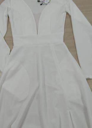 Біле плаття в підлогу з вирізом7 фото