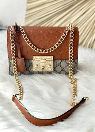 Жіночий брендовий шикарна коричнева сумочка з ланцюгами жіноча стильна коричнева сумка тренд1 фото