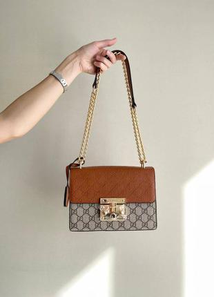 Жіночий брендовий шикарна коричнева сумочка з ланцюгами жіноча стильна коричнева сумка тренд2 фото
