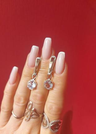 Срібні сережки із золотими вставками