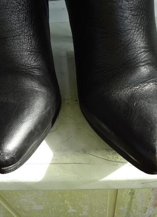 Стильные кожаные ботфорты на цигейке 36р., высокий каблук4 фото