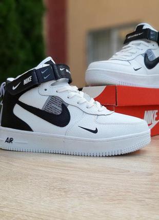 Жіночі кросівки nike air force 1 mid lv8 білі з чорним високі хутро зима9 фото