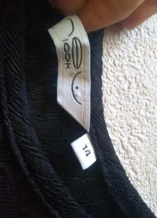 Елегантна блуза жакардовая чорна з баскою розкльошена до низу4 фото