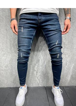 Рвані джинси чоловічі звужені сині туреччина / джинси чоловічі рвані завужені сині турречина