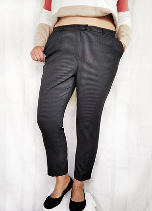 Завужені брюки в смужку