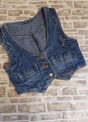 Безрукавка,жилетка