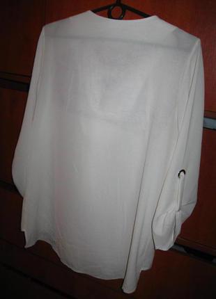 Блуза с люверсами белая3 фото
