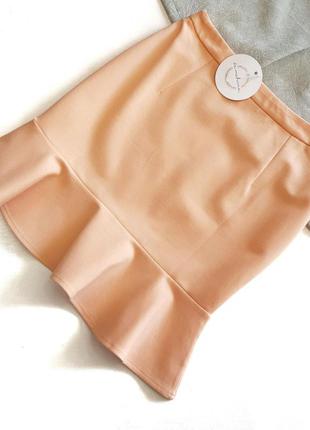 Светлая персиковая юбка со шляркой внизу2 фото