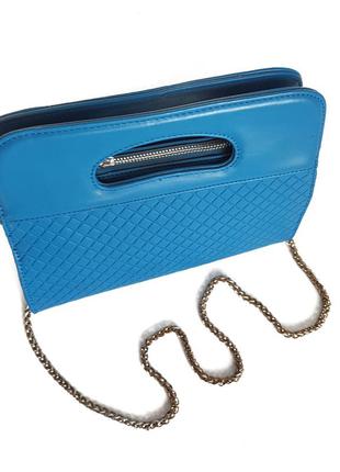 Стильная сумка голубого цвета6 фото