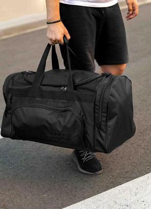 Чоловіча спортивна сумка дорожня nike biz для тренувань на 60 літрів5 фото