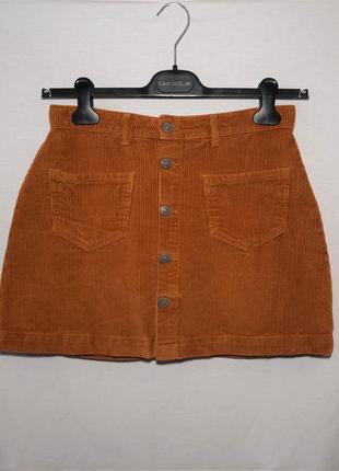 Короткая вельветовая мини юбка с карманами и пуговицами спереди4 фото