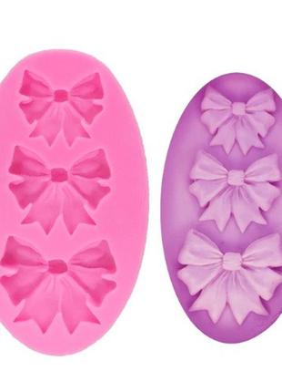 Молд силіконовий бантики 50 на 85 мм рожевий