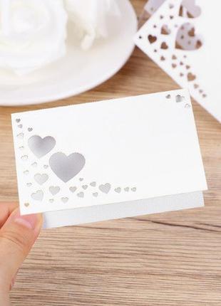 Розсадочні білі картки з сердечками - у наборі 10шт. (розмір в складеному вигляді 9*6см), лазерна обробка3 фото