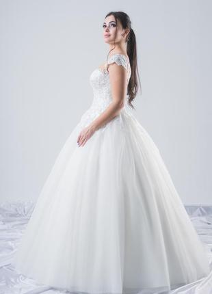 Пышное свадебное платье dream с коротким рукавом.2 фото
