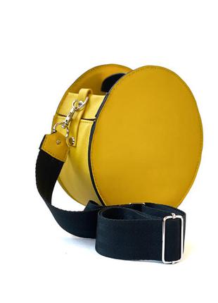 Круглая желтая сумка барабан, ручная работа, экокожа1 фото