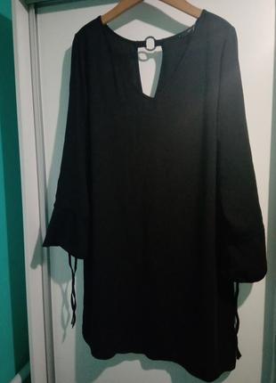 Маленькое чёрное платье рукав колокол на шнкровке5 фото