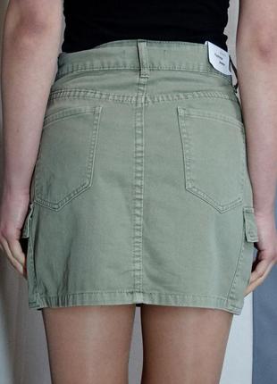 Стильная юбка с карманами цвета оливка4 фото