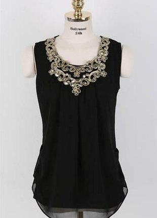 Блузка жіноча чорна без рукавів з ушукрашением на шеии, з-ка