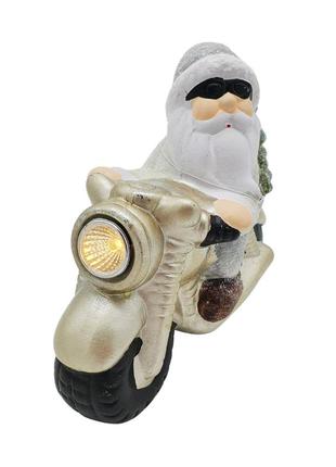 Декоративна новорічна статуетка санта клаус на мотоциклі з led підсвічуванням на батарейках zd trading