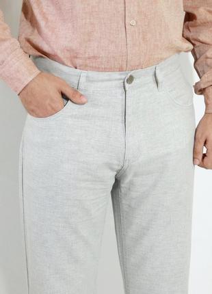 Легкие хлопковые брюки в светло-сером цвете2 фото