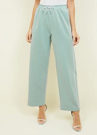 Стильные джоггеры спорт штаны фисташка мята с лампасами   pale blue satin piped side wide leg jogger