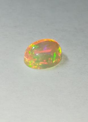 Эфиопский опал кабошон 1.24 ct aaa4 фото