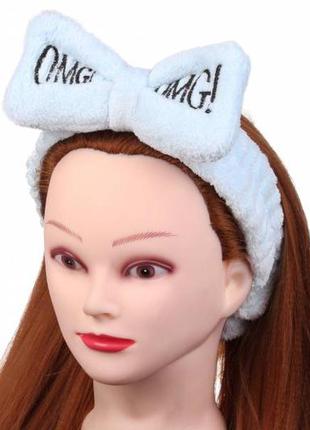 Пов'язка на голову "omg" з бантом блакитна 1-191912