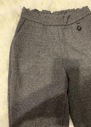 Теплі брюки з узором ялинка2 фото