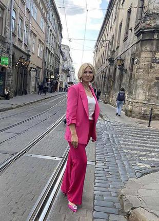 Рожеві брюки кльош палаццо