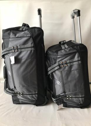 Комплект дорожных сумок на колесах с выдвижной ручкой