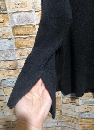 Чёрный свитер с разрезами4 фото