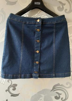 Синяя джинсовая короткая юбка на пуговицах3 фото