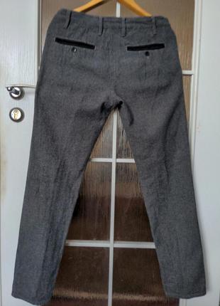 Качественные штаны от известного бренда.4 фото