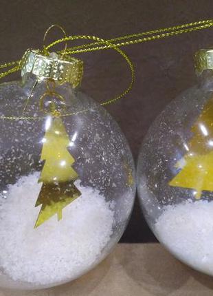 Елочные игрушки h&m home из прозрачного стекла, наполненные искусственным снегом, и украшение золото2 фото