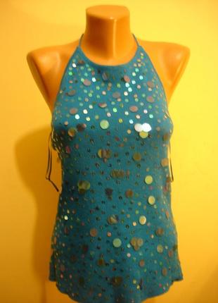 Ошатна жилетка з поетками