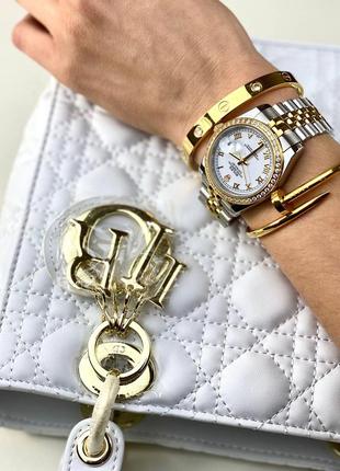 Часы наручные женские брендовые белые серебристые3 фото