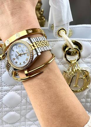 Часы наручные женские брендовые белые серебристые2 фото