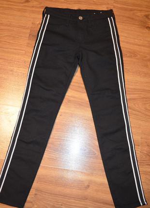 Стрейчевые джинсы , штаны с лампасами на 9/10 лет1 фото