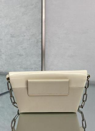 Кожаная дамская сумочка, брендовая10 фото