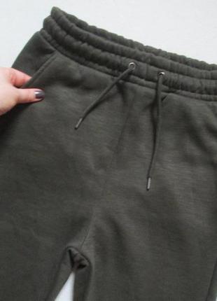 Шикарные трикотажыне тёплые на флисе спортивные штаны джоггеры хаки gina tricot 🍁🌹🍁3 фото