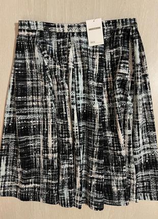 Очень красивая и стильная брендовая юбка-миди.7 фото