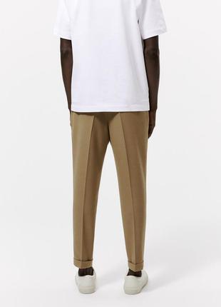 Трендовые укороченные мужские брюки zara с текстурой2 фото