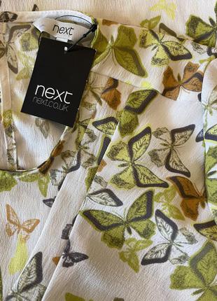 Нереально красивая и стильная брендовая блузка в бабочках.1 фото