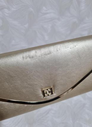 Золотистый клатч escada 3