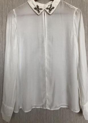 Ошатна білосніжна блузка сорочка benetton з коміром в камені