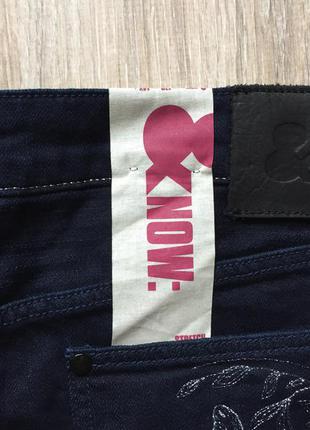 Женская джинсовая юбка h&m мини короткая с вышивкой на карманах8 фото