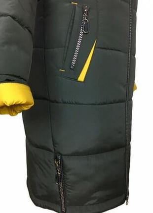 Зимовий пуховик,пальто з капюшоном,і яскравою обробкою.4 фото