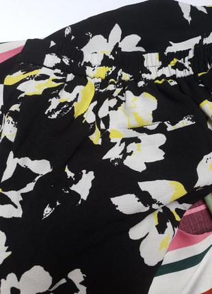 Легкі літні штани у квіти фірми m&co розмір 125 фото