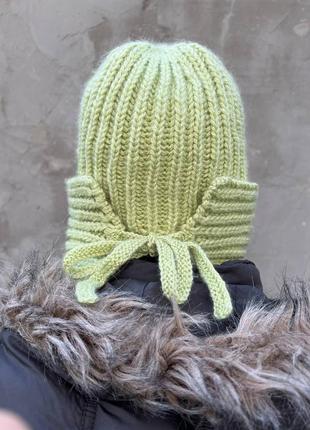 Тренд сезона шапка-ушанка крупной вязкой ангора