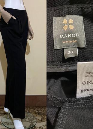 Черные брюки с защипами